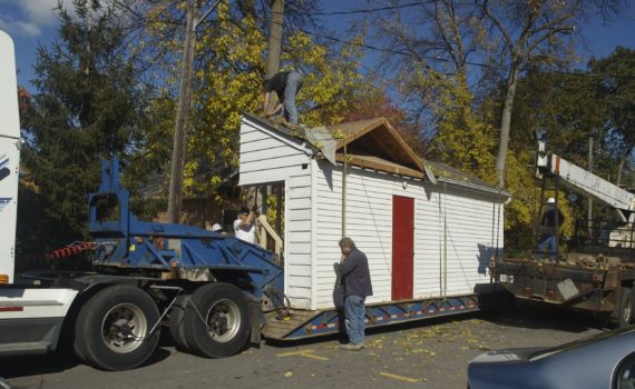 Photo of a house that was cut in half in order to be moved.